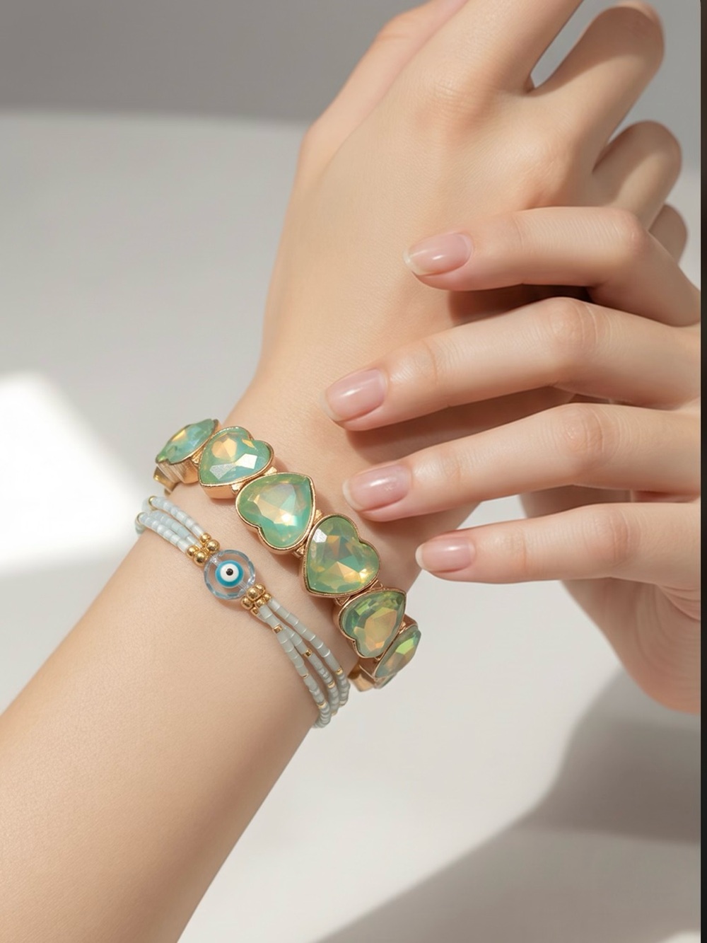 Gold Bracelet Set with Mint Green Heart Stones and Beaded Evil Eye Accent